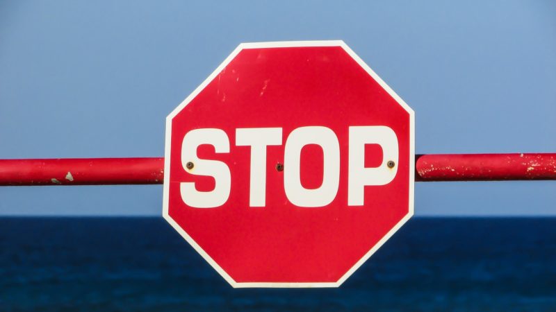 stop sign on gate