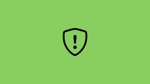 shield icon with exclamation mark on green background